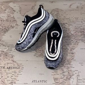 Gently used Nike reflective Air-Max 97’